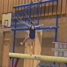 Gymnast on a balance beam dance