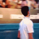 Woman snatches Djokovic's shirt