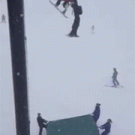 Skier falls off chair lift