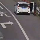 Woman resting on road shoulder gets hit by runaway tire