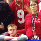 Girl removes hand from guy when realizing she's on TV
