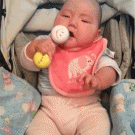 Baby accidentally hits self with toy