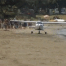 Plane crashes while taking off on a beach