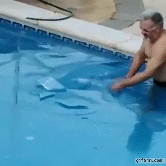 Man crosses swimming pool under ice
