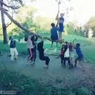 Kids use tree as swing