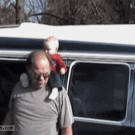 Old man almost drops baby