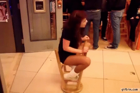 Girl spinning on stool
