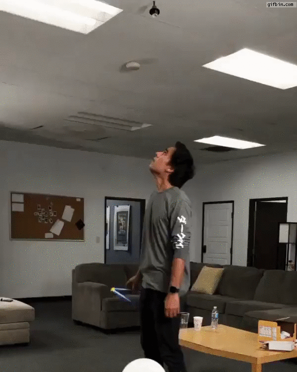 Using ladder to change light bulb illusion