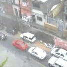 Wall collapses on cars