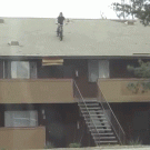 Bicycle jump from rooftop down stairs
