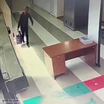 Guy takes bag through customs