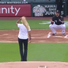 Blond girl throws first pitch