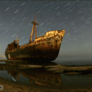 Wrecked ship night sky time-lapse