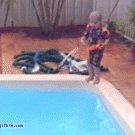 Girl jumps on girl in pool