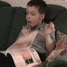 Kid licks wrong finger while reading magazine