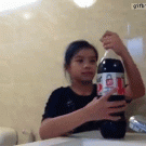 Girl opens diet Coke with Mentos