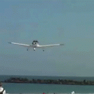 Plane almost lands on sunbather on the beach