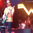 Weezer drummer catches frisbee during concert