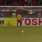 Soccer player falls before scoring penalty kick