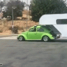VW Beetle with trailer turns around