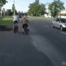 Biker almost hit by SUV