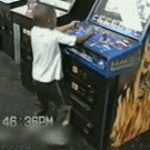 Kid playing on arcade