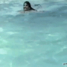 Guy goofing in swimming pool bangs head