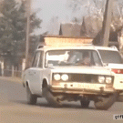 Russian car tiptoeing backwards