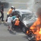 Bystanders rescue man from under burning car