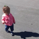 Little girl gets scared of her own shadow