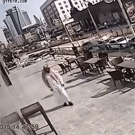 Giant mirror falls on guy walking on the street