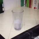 Pouring water into glass illusion