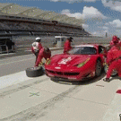 Ferrari race car is dropped before wheel is put back on