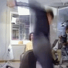 Bill Gates leaps over a chair