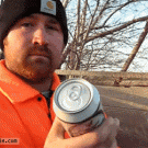 Man opens beer can with teeth
