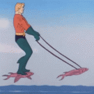 Aquaman flying on fish
