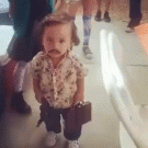 Kid in Pablo Escobar Halloween costume