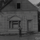 House wall falls over Buster Keaton (Steamboat Bill, jr.)