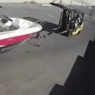 Guy stopping boat and forklift