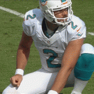 Miami Dolphins holder football to the face