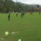 Soccer player trips on water bucket